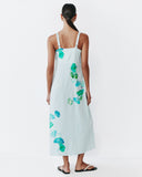 Model wears Strappy Column Dress in white based Sama pinstripe Print 