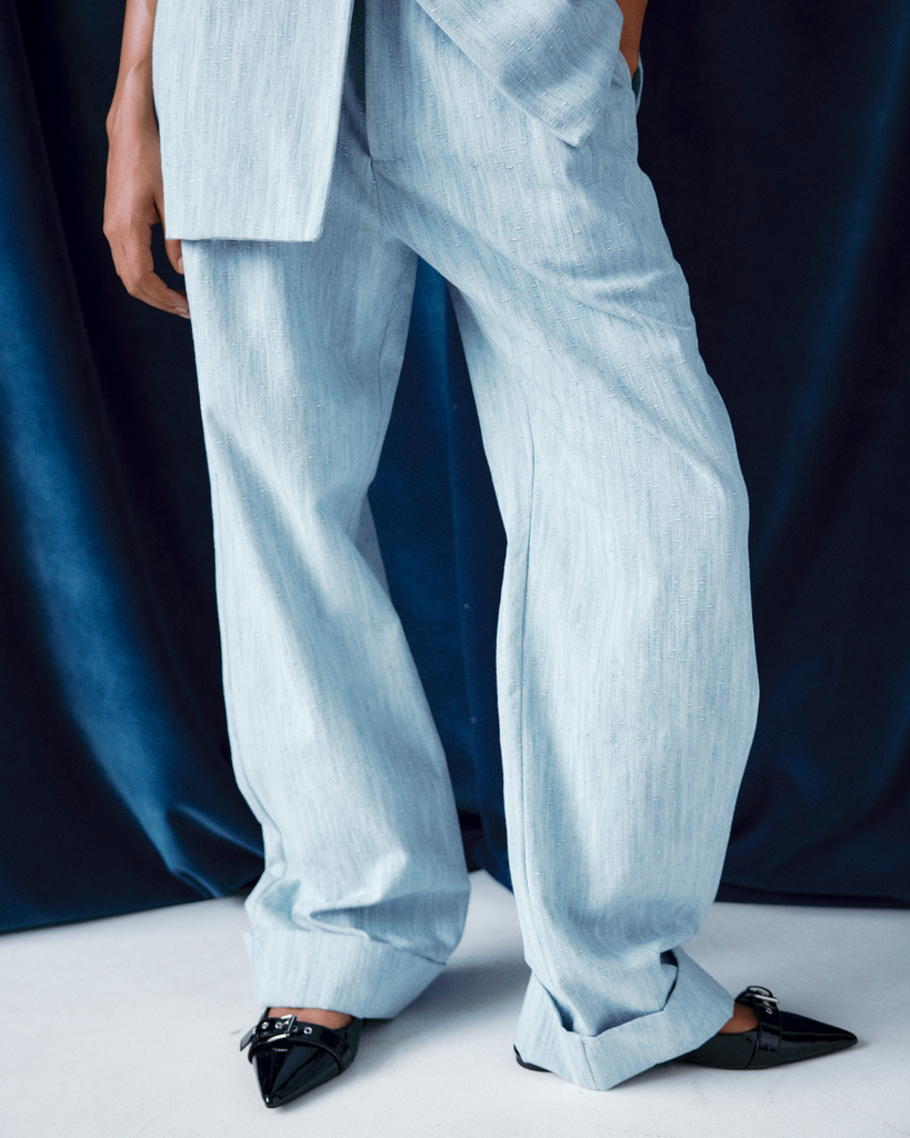 Model wears Suit Pants in Elemental Denim.