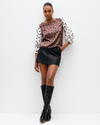 Model wears Bishop Sleeve Top in Timeless Polka