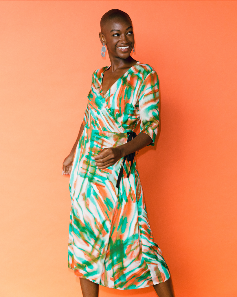 Model wears Tropical Fern Wrap Dress