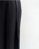 Black fabric texture on a white background