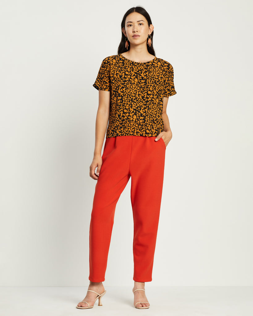 Model wearing Mustard Fleck Dolman Top