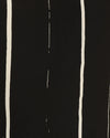 Close up of Black and cream stripe 100% silk fabric