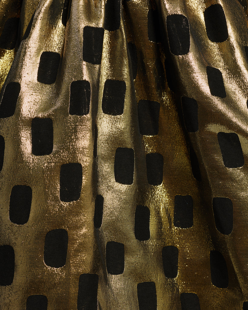 Close up of Gold and Black patterned Fabric