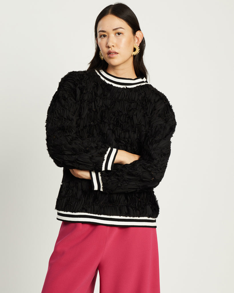 Model wears Textured Umbra Varsity Rib Pullover