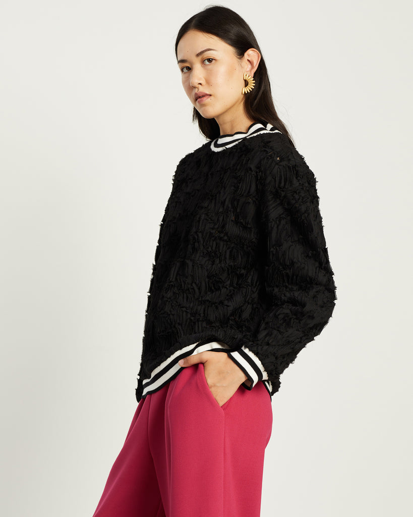 Model wears Textured Umbra Varsity Rib Pullover